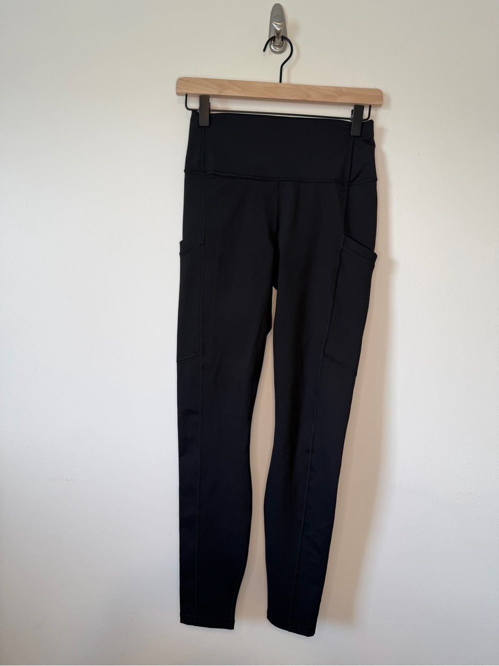 Fabletics Black On-The-Go PowerHold High-Waisted Leggings with side pockets S